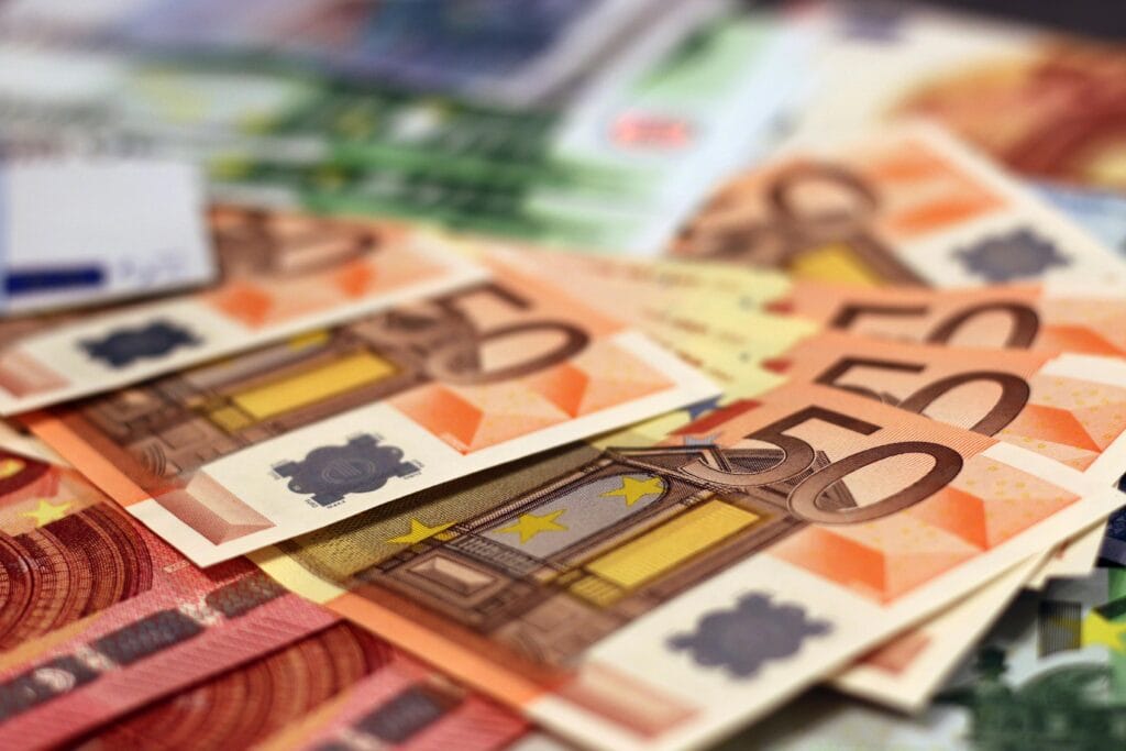 pexels-photo-259249-259249 Stack of 50 euro banknotes, representing wealth and finance concepts.
